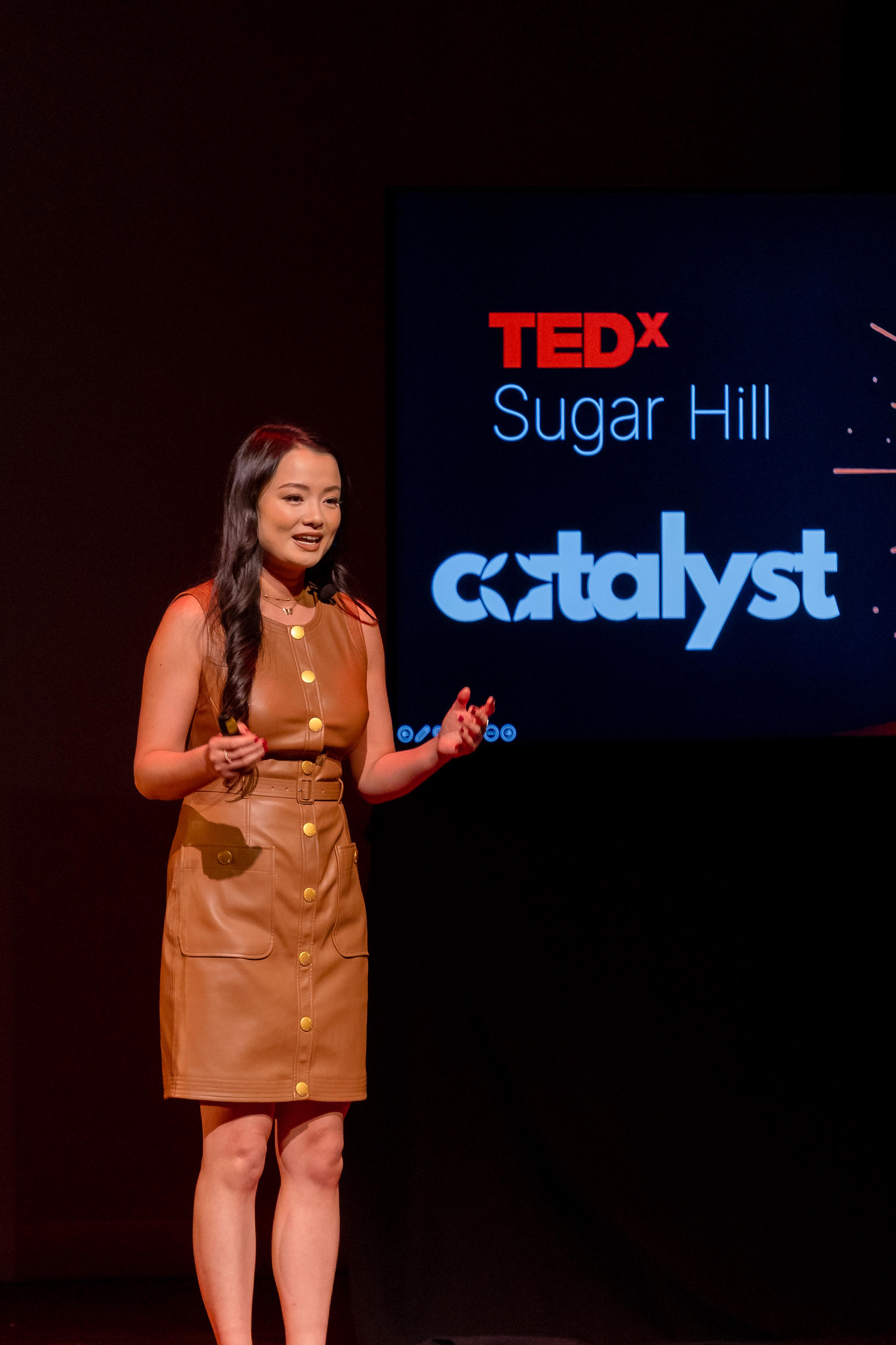 Dr. Yi Zhang speaking at TEDx Sugar Hill